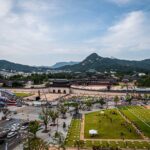 Gyeongbokgung palace in seoul with mountains behind.