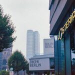a view of a street with a building in the background