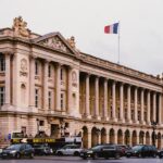 a large building with a flag on top of it