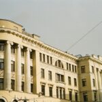 a large building with a clock on the front of it