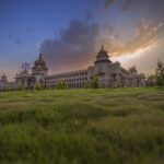 architecture, travel, outdoors, sky, nature, ancient, vidhan, soudha, bangalore, bengaluru, palace, grass, green, sunset, building, india, indian architecture, legislature, karnataka, tourism, landmark, landscape, history, traditional, historic, historical, park, vintage, stone