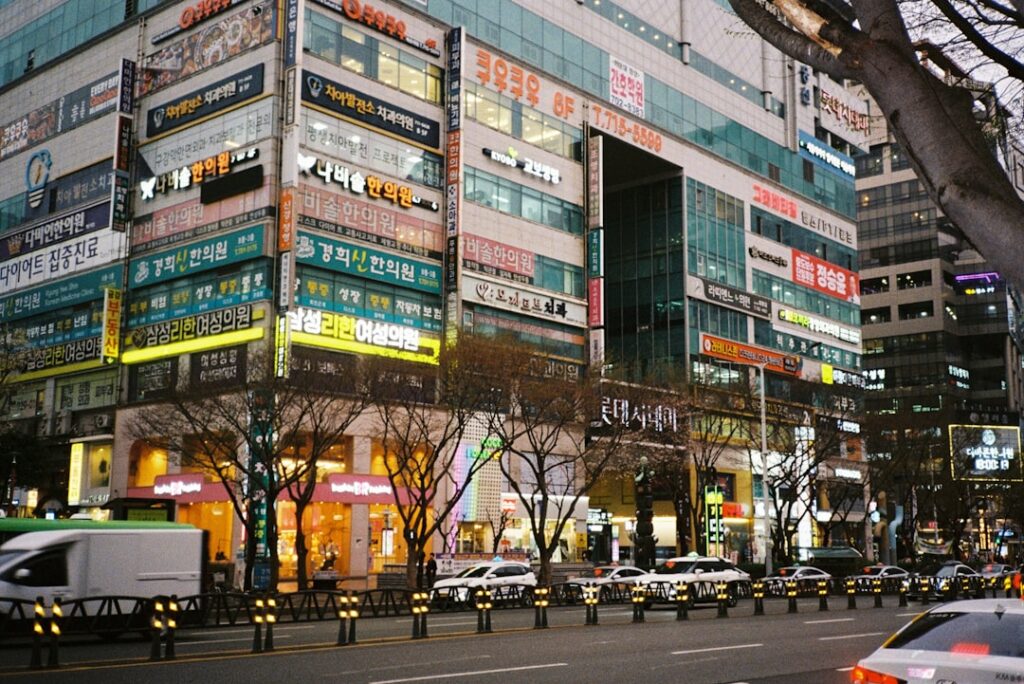 A busy city street with tall buildings.