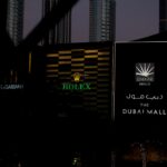 A building with a lot of signs in front of it