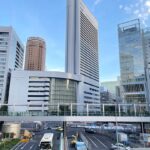 a view of a city with tall buildings in the background