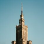 a tall building with a clock on the top of it