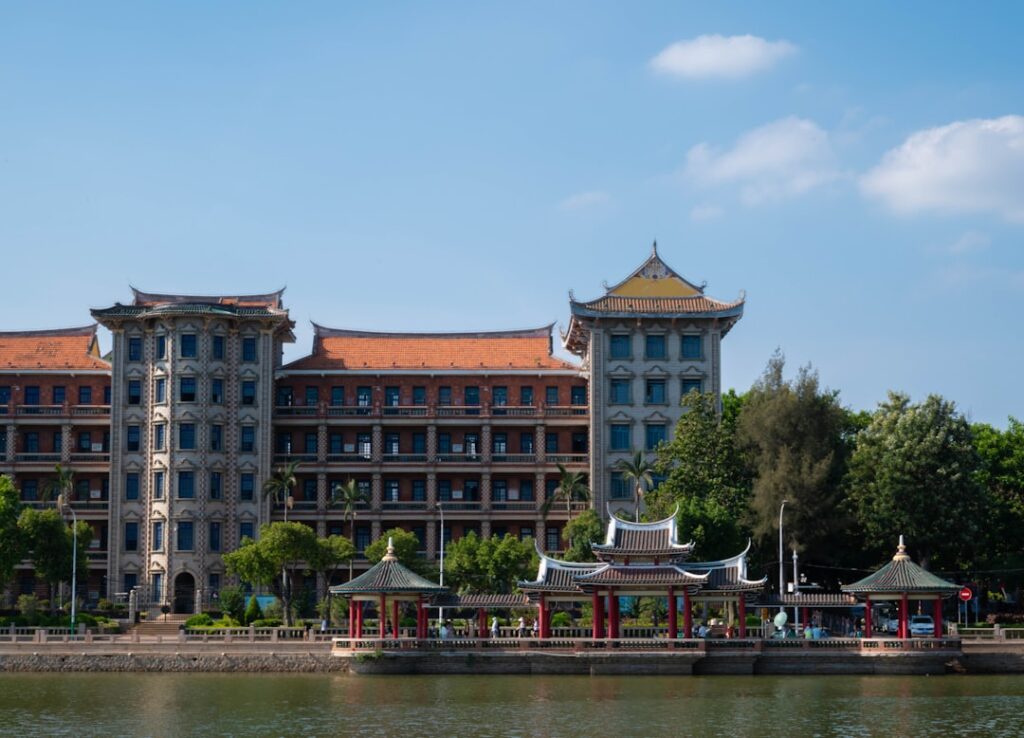 a large building next to a body of water