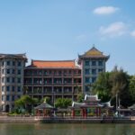 a large building next to a body of water