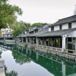 A picturesque canal scene with traditional buildings.