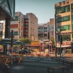 a city street with a lot of tall buildings