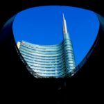 architectural photography of gray and blue concrete building