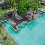 An aerial view of an outdoor swimming pool