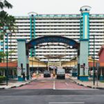 a large building with a blue and green entrance