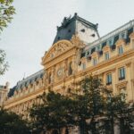 a large building with a clock on the top of it