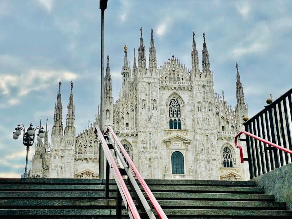 a very tall building with a clock on it's side