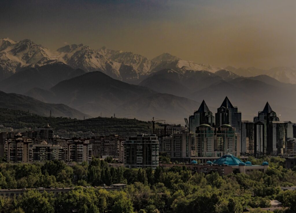 a city with mountains in the background